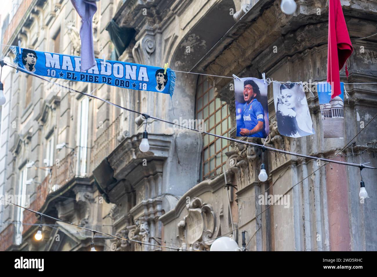 Diego Maradona and Sofia Loren scarf and poster displayed on a street in Naples-Italy. Stock Photo