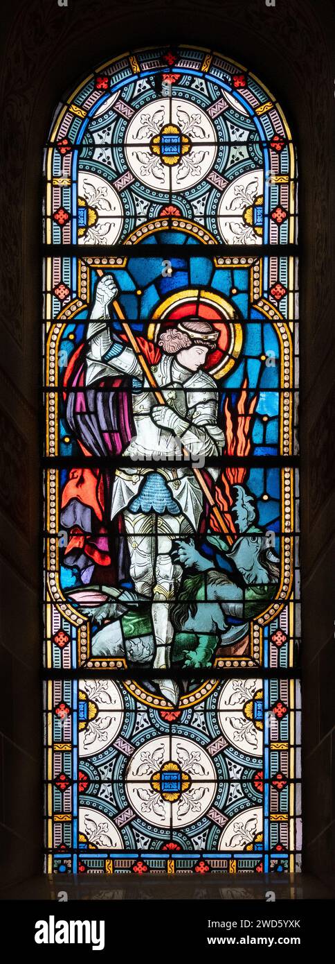 Saint Michael the Archangel. A stained-glass window in Église de la Sainte-Trinité (Holy Trinity Church) in Walferdange, Luxembourg. Stock Photo