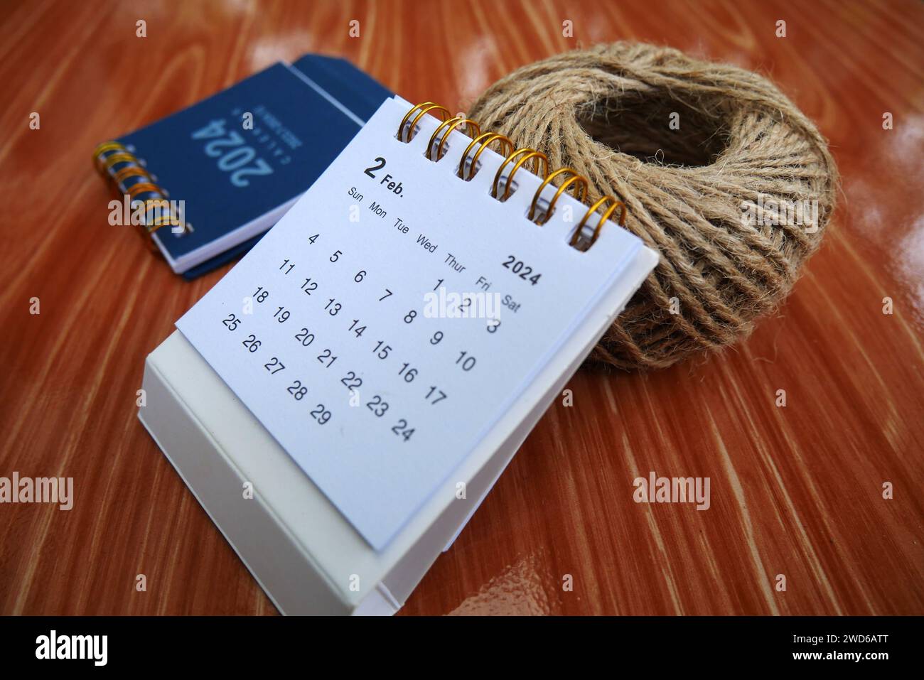 February 2024. Desk calendar for February 2024 on the marble table ...