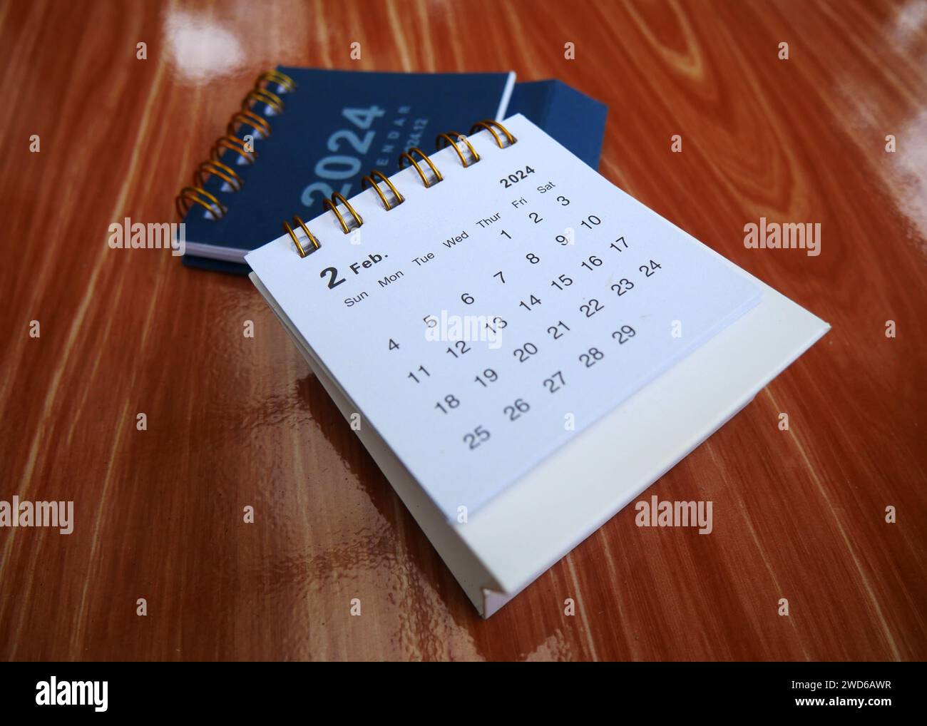 February 2024. Desk calendar for February 2024 on the marble table ...