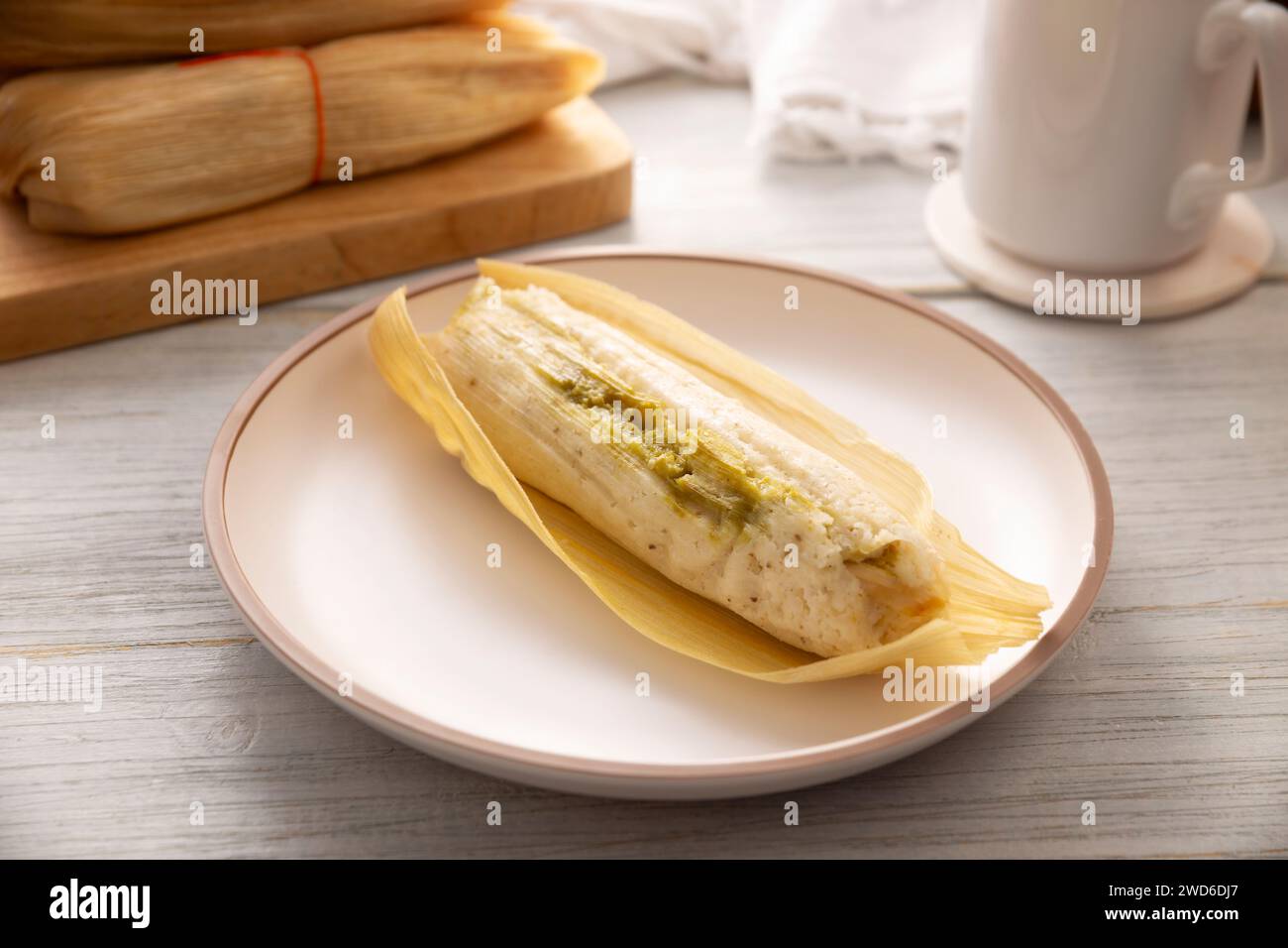 Tamale. hispanic dish typical of Mexico and some Latin American countries. Corn dough wrapped in