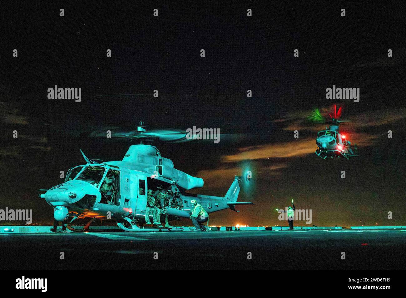 Pacific Ocean. 9th Jan, 2024. UH-1Y Vipers, assigned to the White Knights of Marine Medium Tiltrotor Squadron (VMM) 165 (Reinforced), transport Marines assigned to Reconnaissance Company, 15th Marine Expeditionary Unit (MEU), during a training exercise aboard the San Antonio-class amphibious transport dock ship USS Somerset (LPD 25) while underway in the Pacific Ocean, January. 9, 2024. The Boxer Amphibious Ready Group, comprised of USS Boxer (LHD 4), Somerset, and USS Harpers Ferry (LSD 49), and the embarked 15th MEU are underway conducting integrated training and routine operations in U. Stock Photo