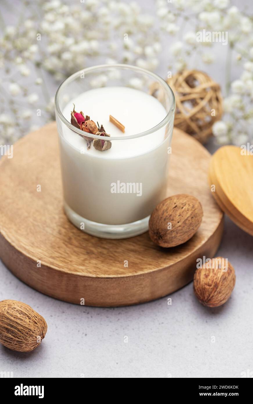 Aromatic candle on the table. Soy candles in a jar. Aromatherapy and ...