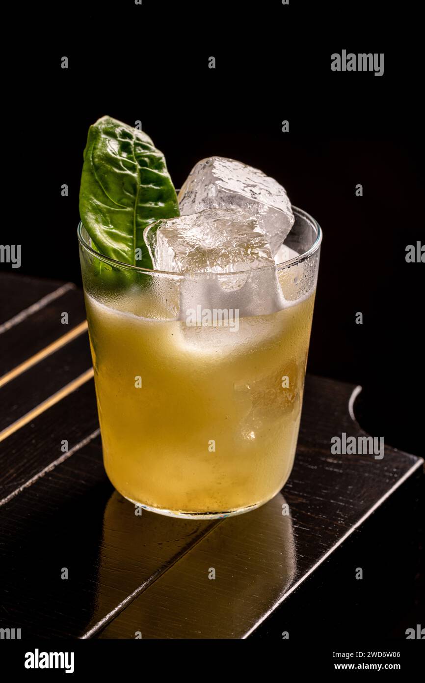 Luxury cocktail on the wooden table on a dark background Stock Photo