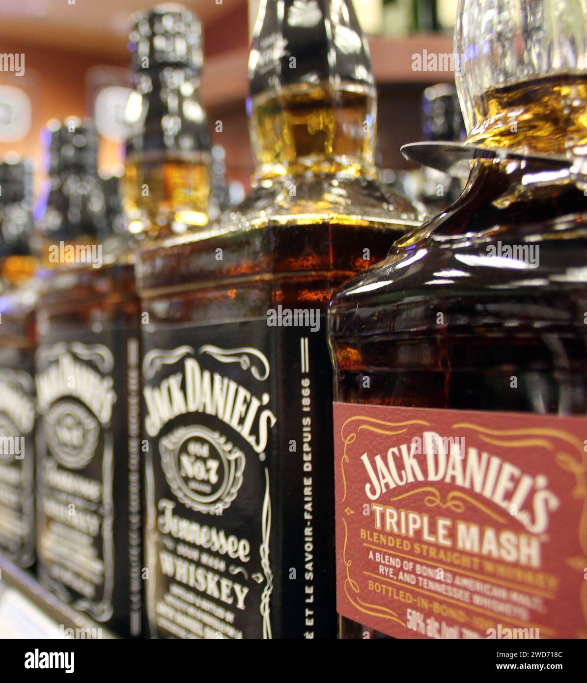 A display of Jack Daniel's whiskey bottles on the shelf of a liqueur