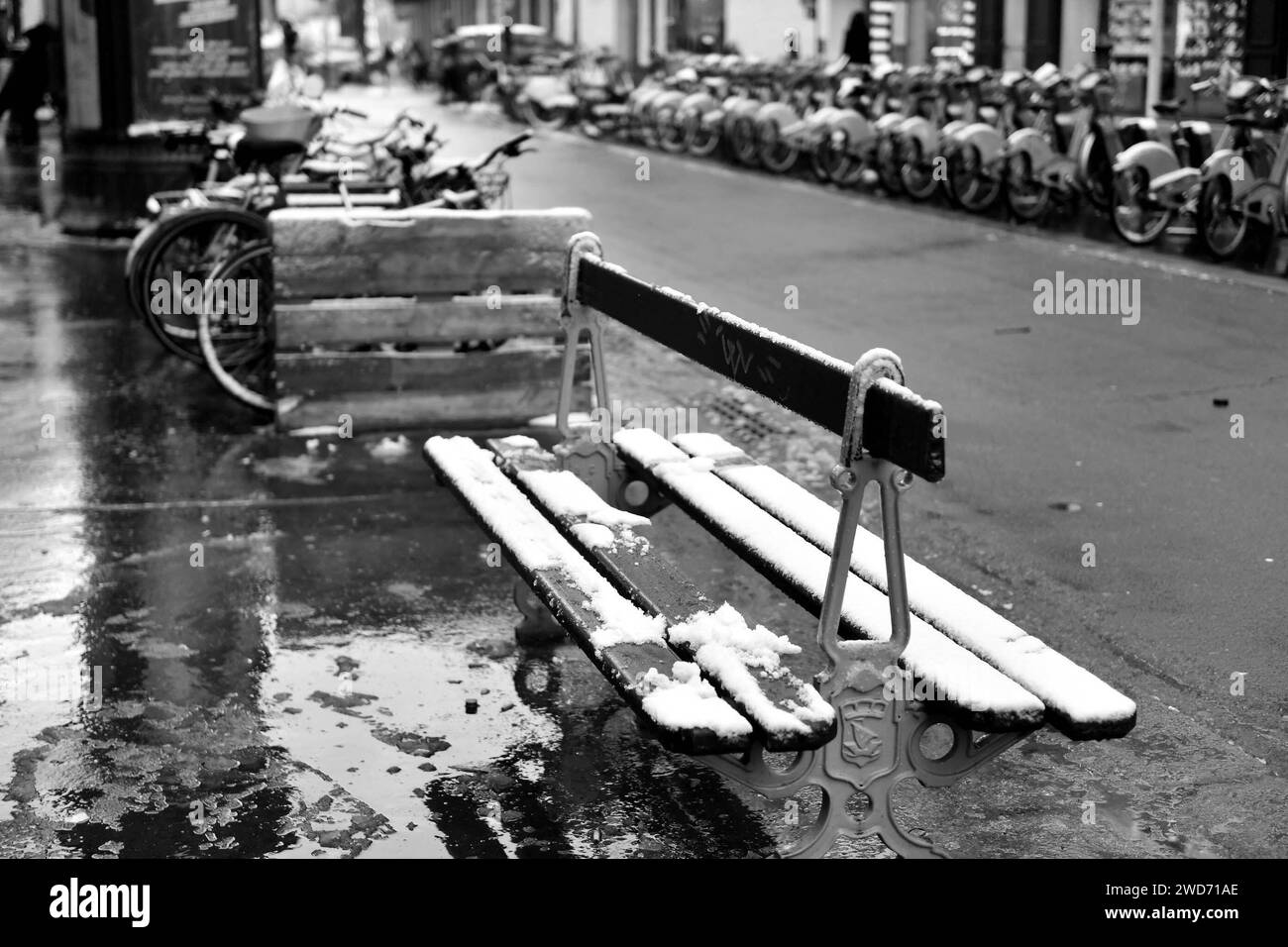 Paris, France. 18th Jan, 2024. Streets of Paris covered with a snow