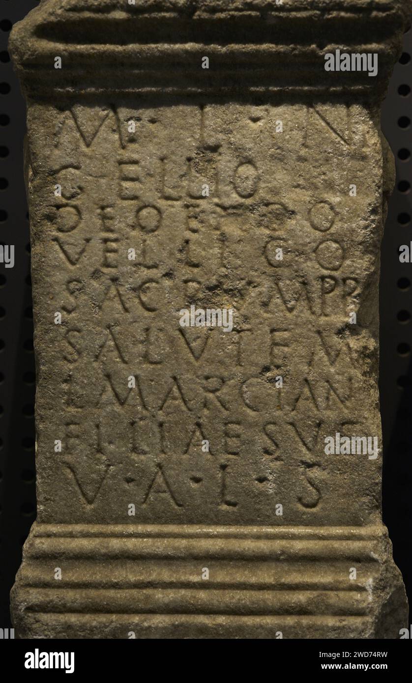 Stone altar consecrated to Endovellicus, by Marcus Licinius Nigellius. The inscription can be translated as 'Marcus Licinius Nigellius, to the God Endovellico, fulfilled his vow for the health of his daughter Licinia Marciana'. 2nd century AD. Detail. Sao Miguel da Mota. Terena. Alandroal, Evora. Portugal. National Archaeology Museum. Lisbon, Portugal. Stock Photo