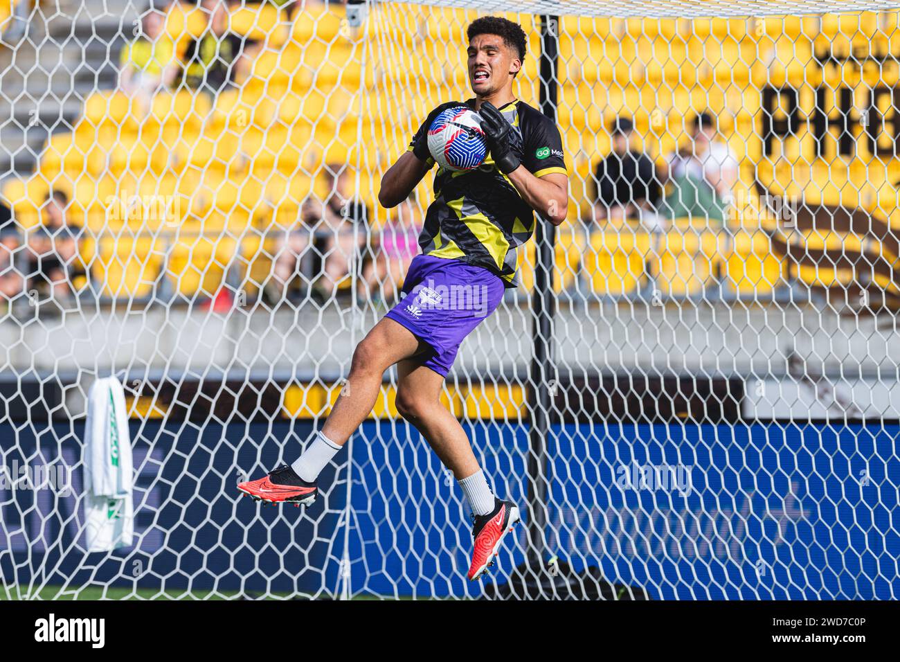 Friday 19th January 2024. A-League - Wellington Phoenix vs. Melbourne Victory. Wellington Phoenix goalkeeper Alex Paulsen makes a save in the warmup prior to the A-League clash between Wellington Phoenix and Melbourne Victory at the Sky Stadium. Credit: James Foy/Alamy Live News Stock Photo