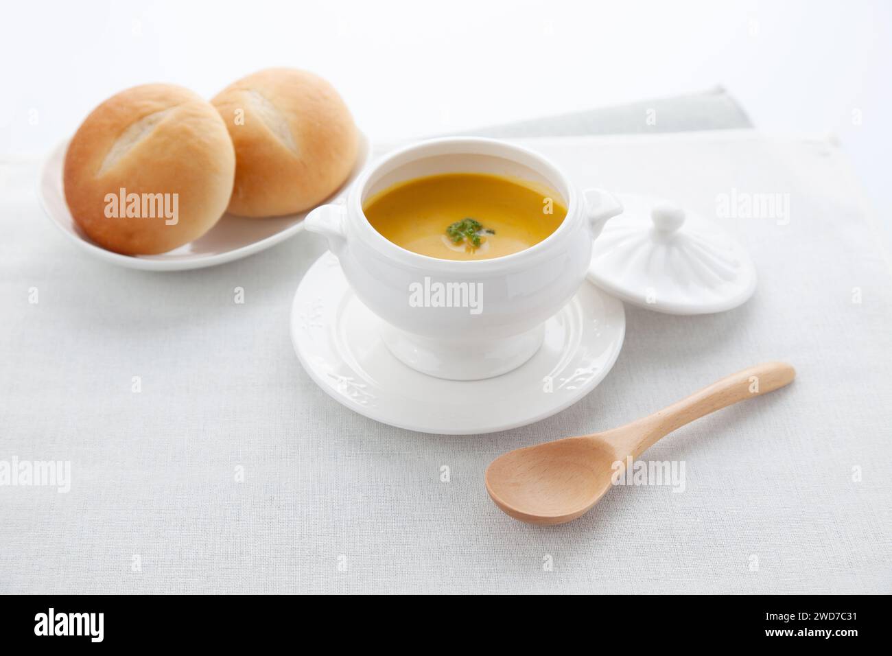 pumpkin potage soup isolated on table Stock Photo