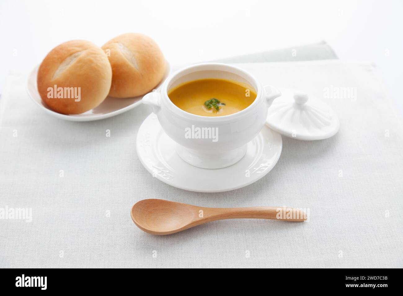 pumpkin potage soup isolated on table Stock Photo
