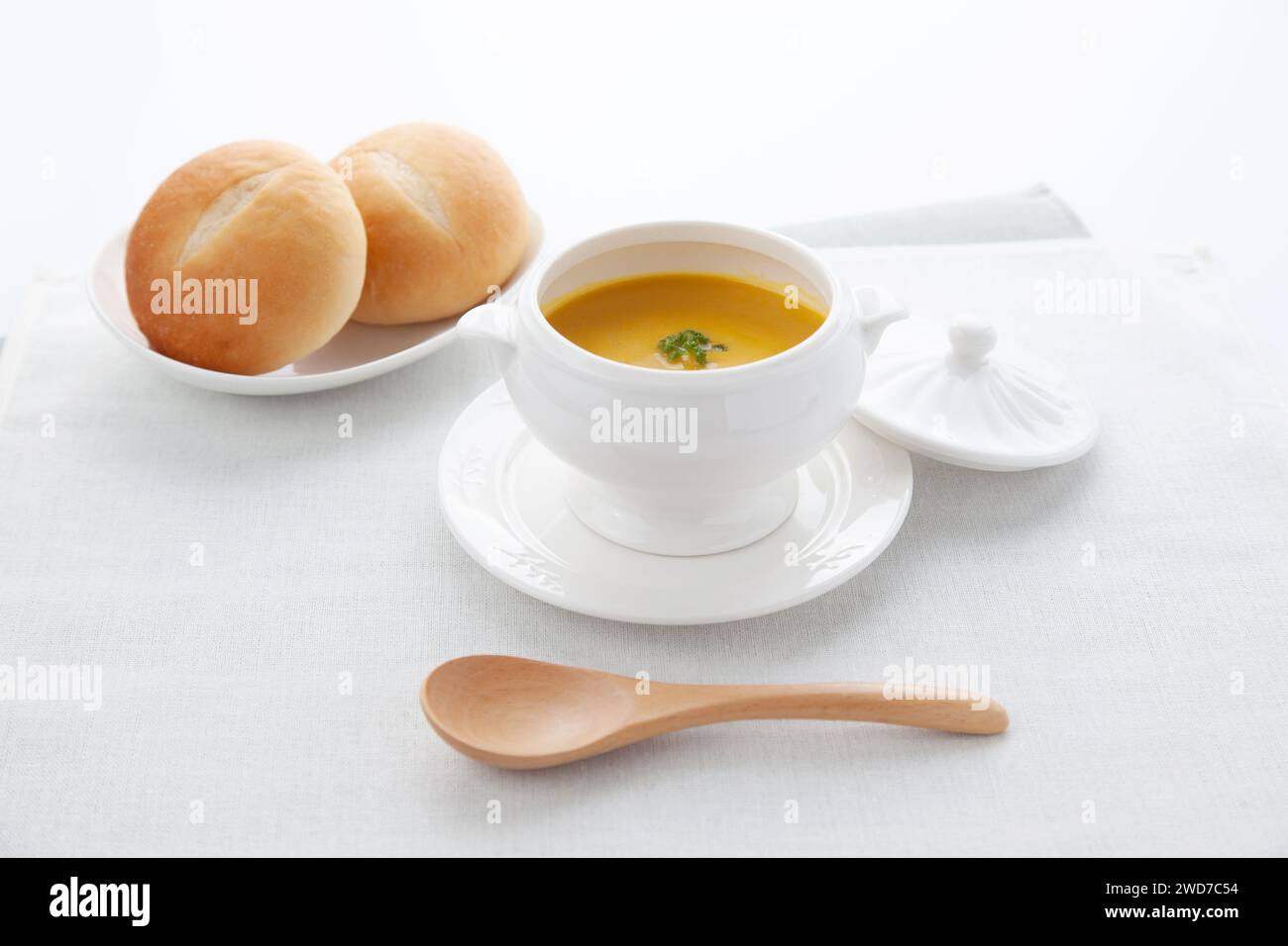 pumpkin potage soup isolated on table Stock Photo