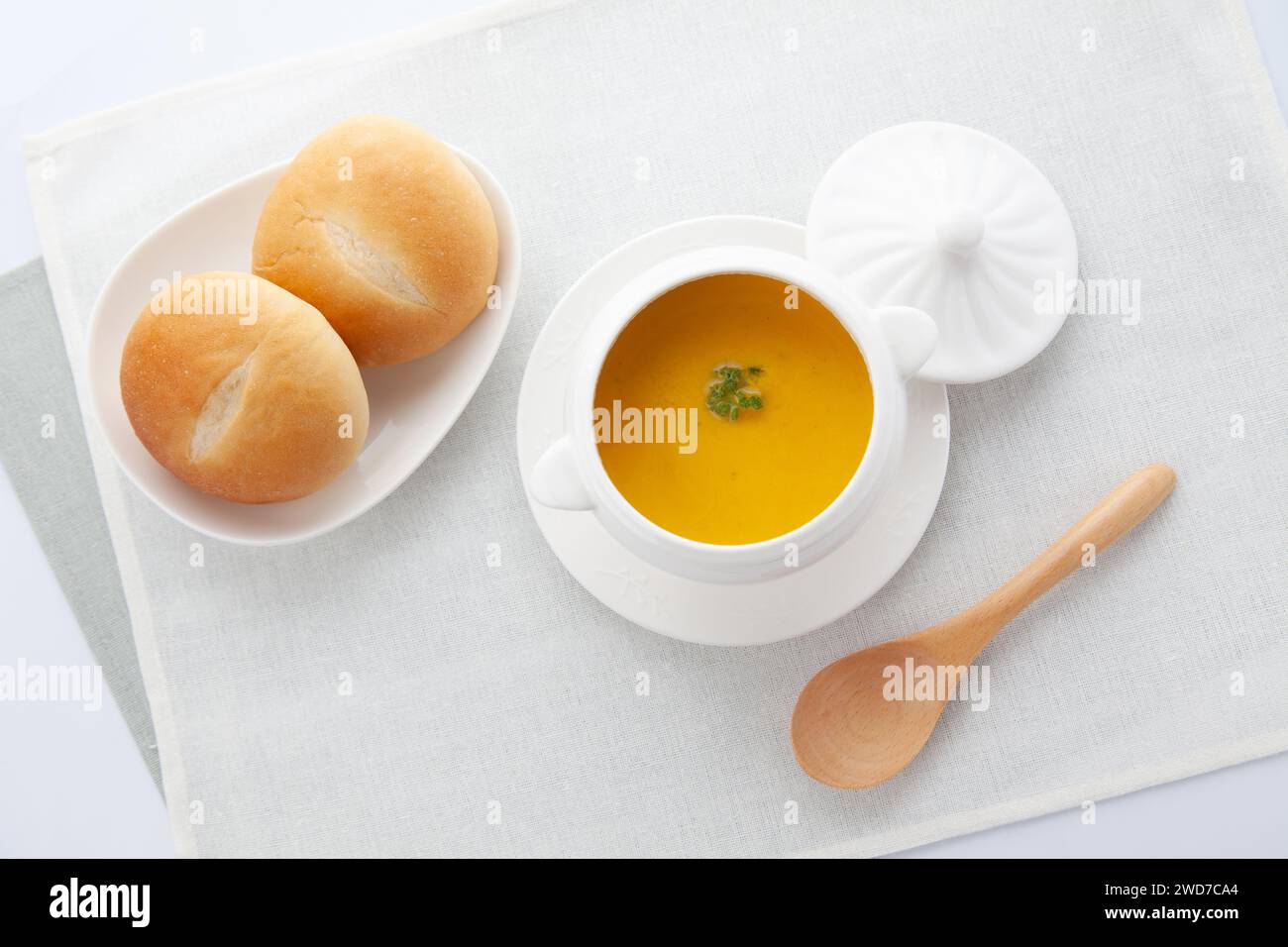 pumpkin potage soup isolated on table Stock Photo