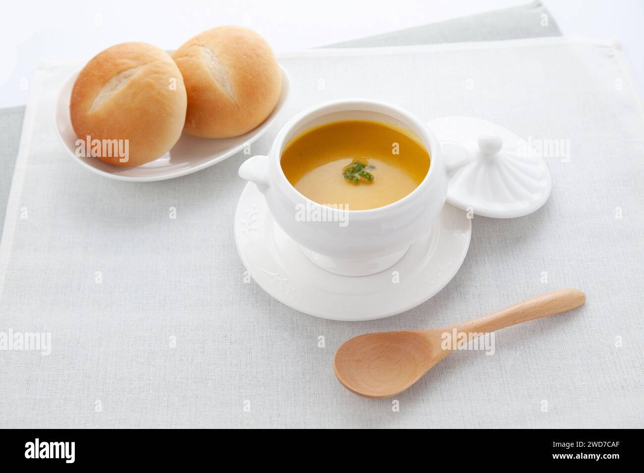 pumpkin potage soup isolated on table Stock Photo