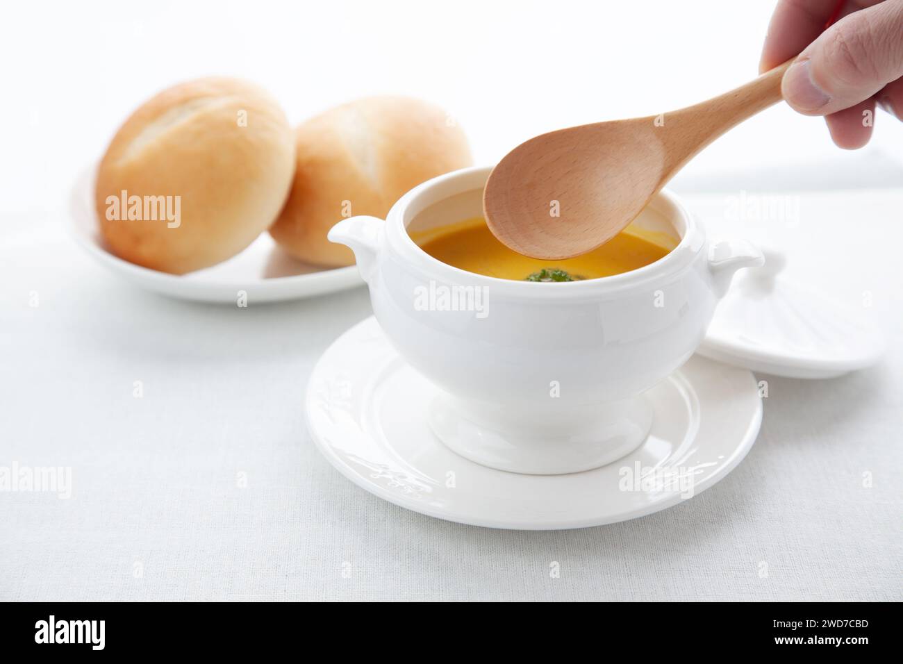 pumpkin potage soup isolated on table Stock Photo