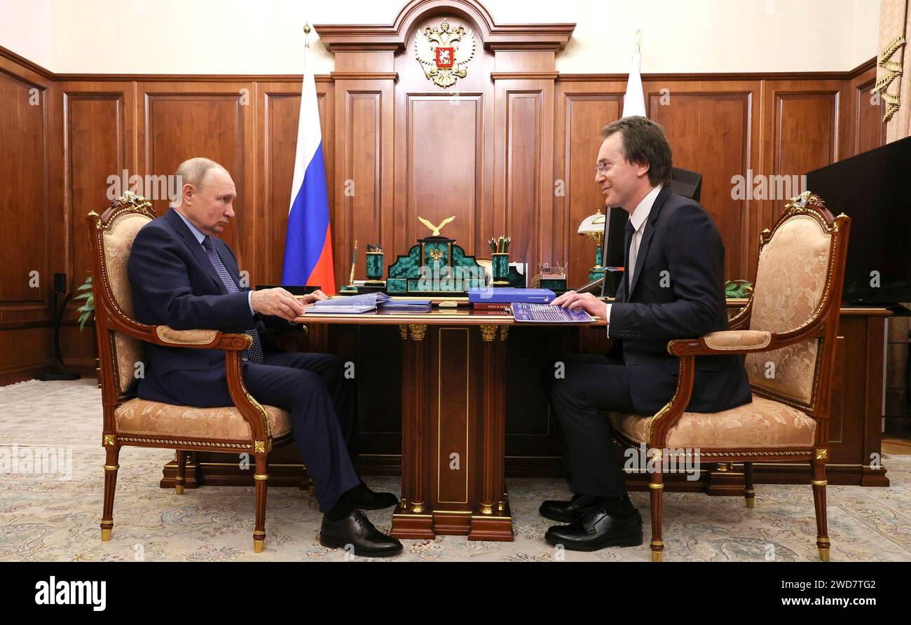 Moscow, Russia. 18th Jan, 2024. Russian President Vladimir Putin, left, listens to Bamtonnelstroy-Most chairman Ruslan Baisarov during a face-to-face meeting at the Kremlin, January 18, 2024 in Moscow, Russia. Credit: Gavriil Grigorov/Kremlin Pool/Alamy Live News Stock Photo