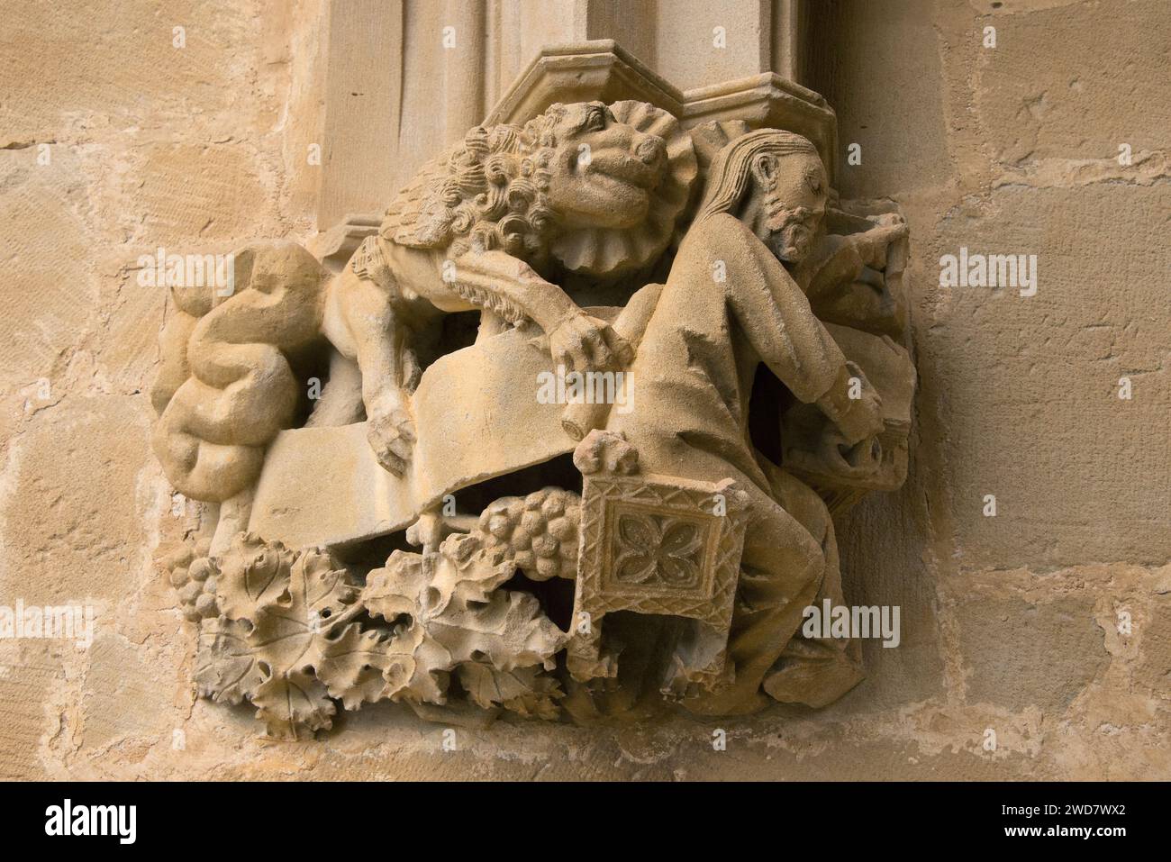 Ujue or Uxue, Santa Maria church (romanesque and gothic 11-14th centuries). Saint Mark and lion. Navarra, Spain. Stock Photo