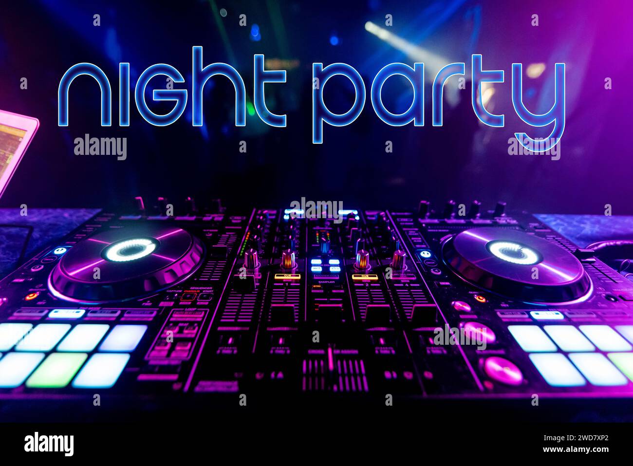 Text Night Party on the background of the dj mixer in the night club Stock Photo