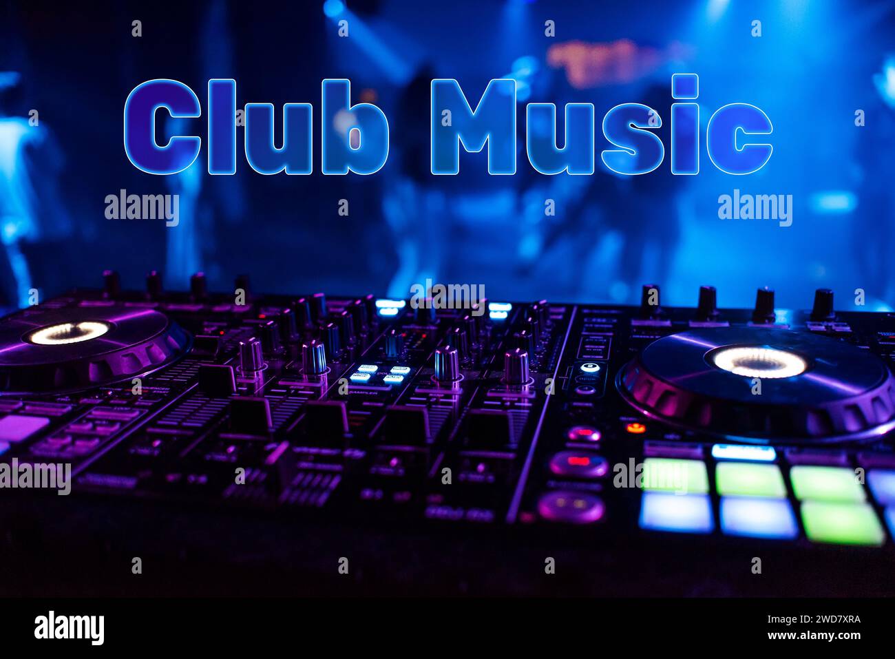 Inscription Club Music on the background of the dj mixer in the night club Stock Photo