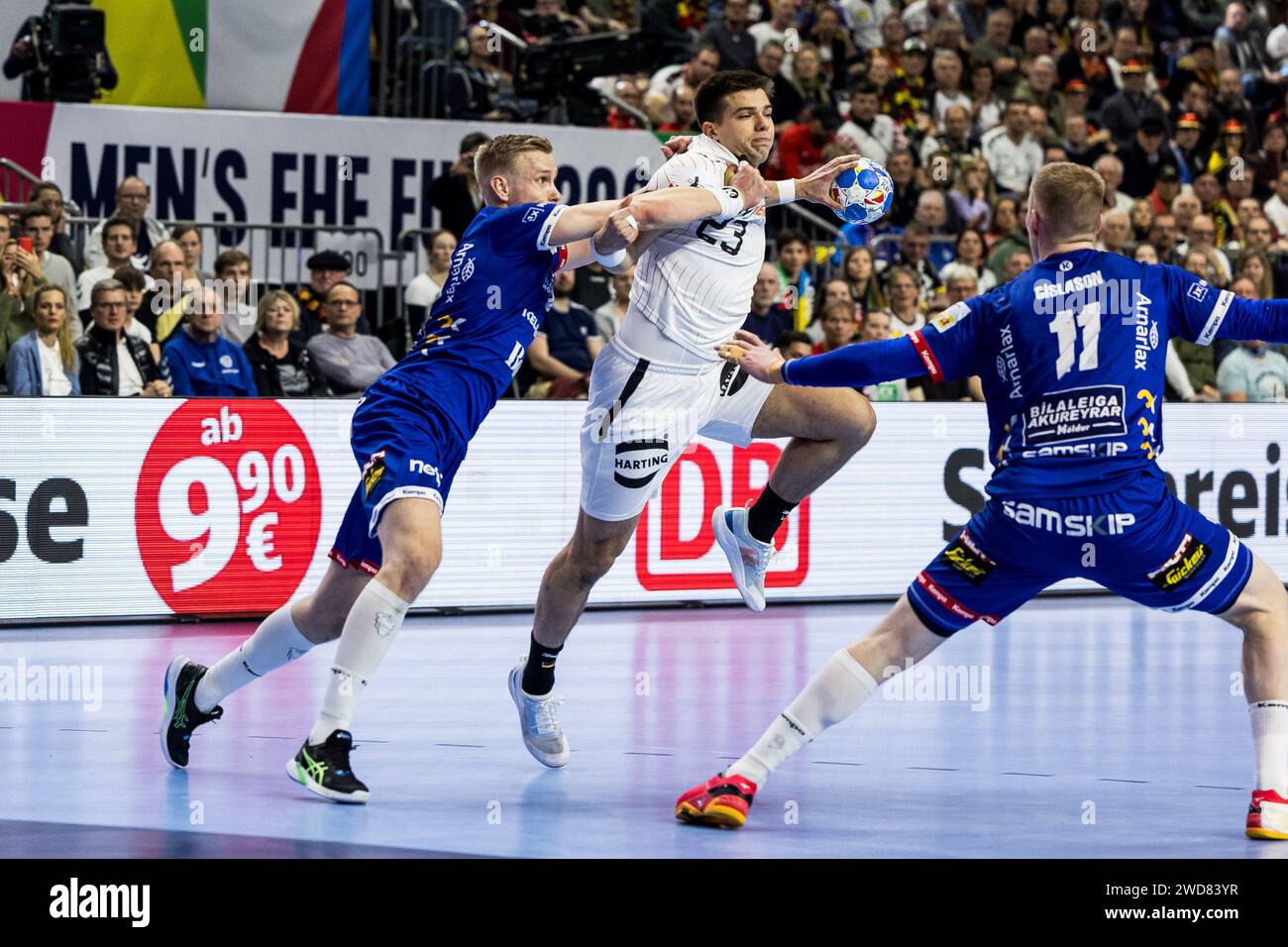 Renars Uscins of Germany and Ellidi Vidarsson, Ymir Gislason of Iceland ...