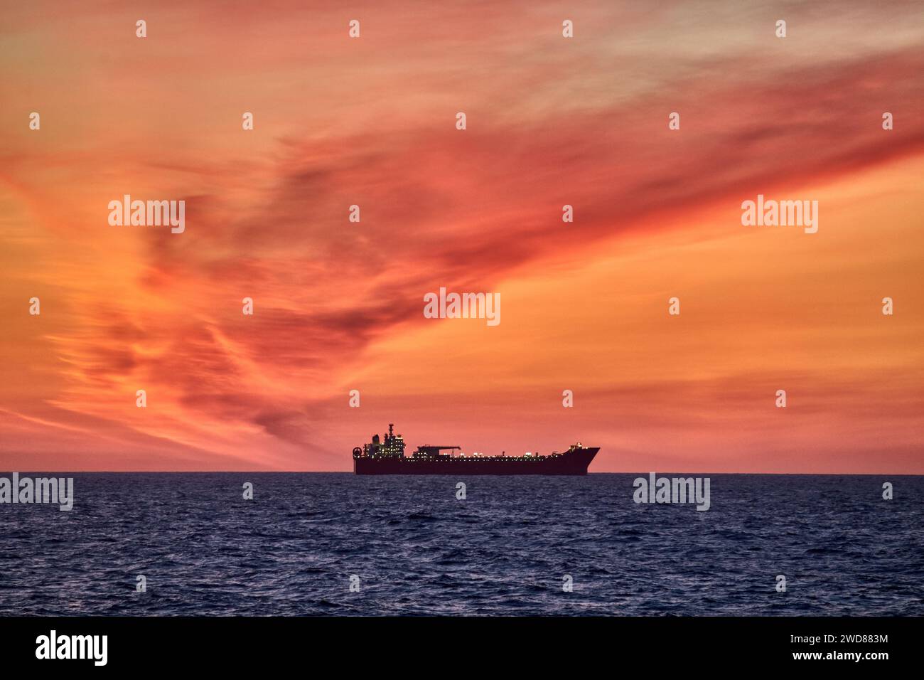 Panoramic view of colourful ocean sky , with red and orange clouds ...