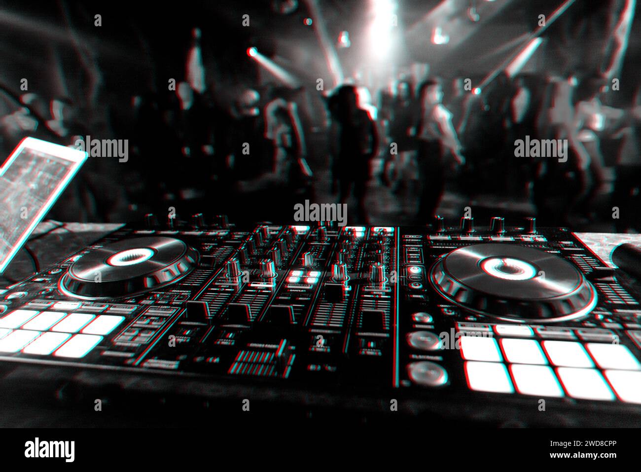 music mixer DJ controller Board for professional mixing of electronic music in a nightclub at a party. Black and white photo with glitch effect and sm Stock Photo
