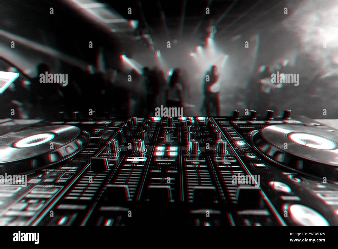 professional DJ mixer controller for mixing music in a nightclub with dancing people on the dance floor. Black and white photo with glitch effect and Stock Photo