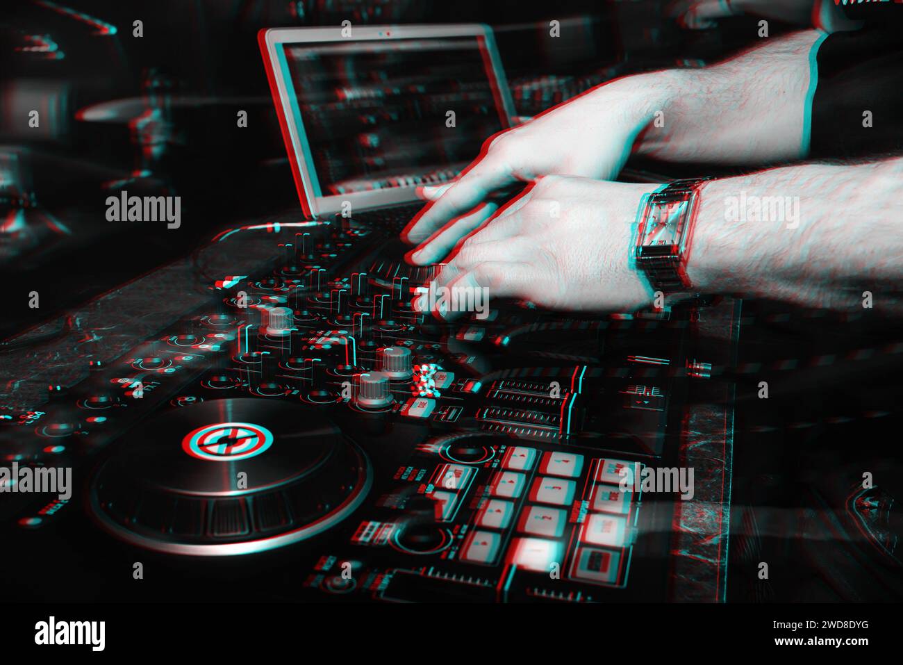 DJ in the booth playing in a nightclub on the background of the mixer. Black and white photo with glitch effect and small grain Stock Photo