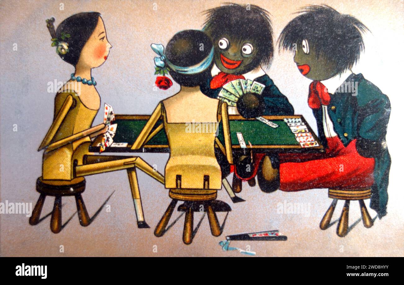 Postcard of Two Golliwogs & Two Penny Wooden Dolls Playing Cards by Florence Kate Upton Stock Photo