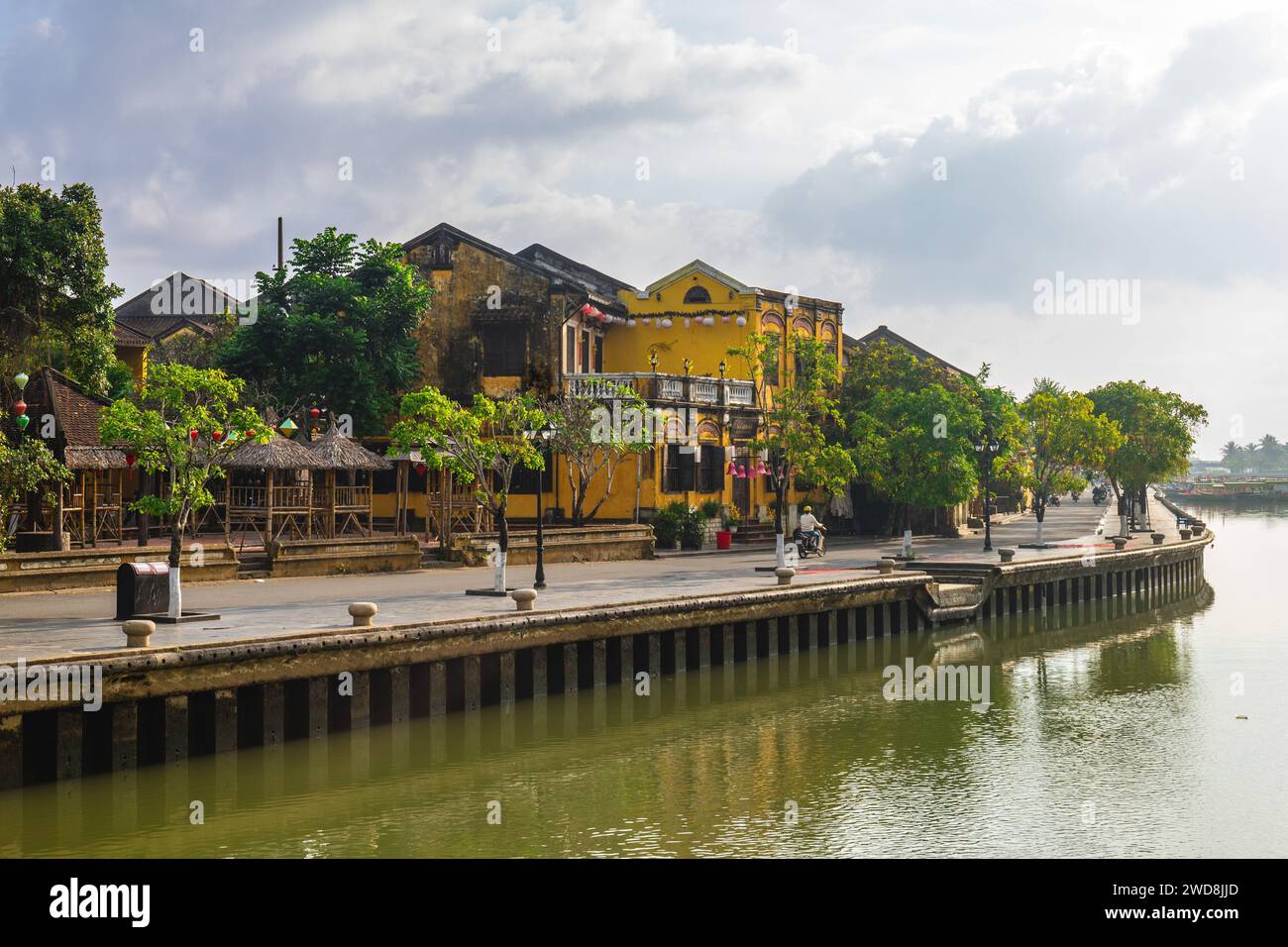 Scenery of the riverbank of Hoi An ancient town, an unesco heritage site in Vietnam Stock Photo