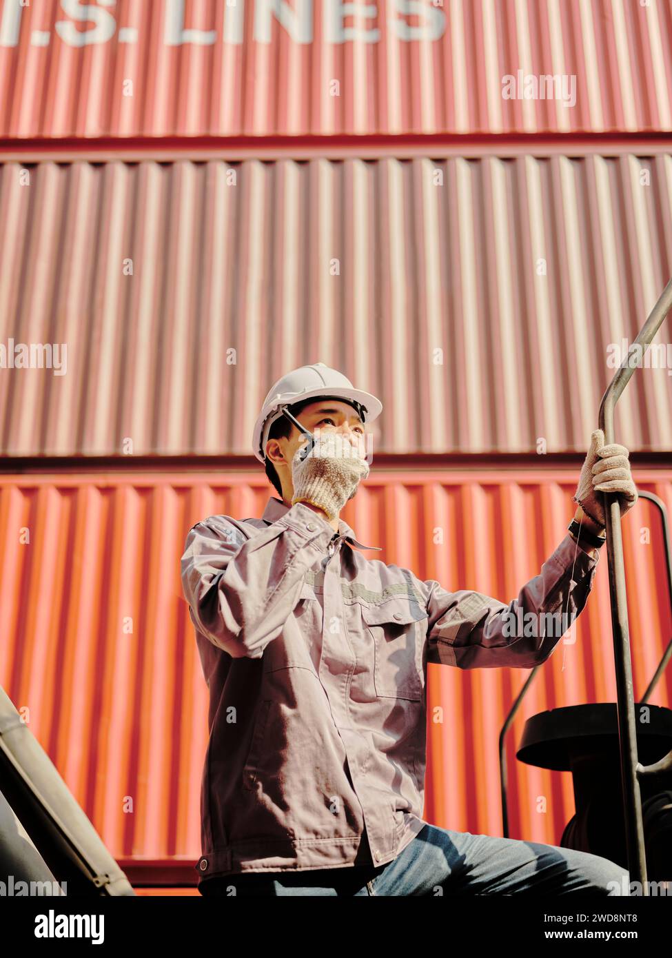 Engineer is pointing controlling the job at the Container cargo