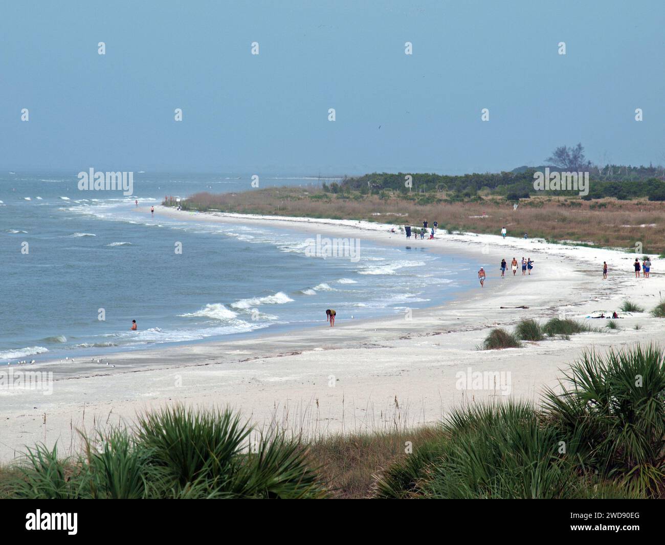 St. Petersburg, Florida, United States - December 24, 2015: Beach in Fort De Soto County Park. Gulf of Mexico. People walking on the shores. Stock Photo