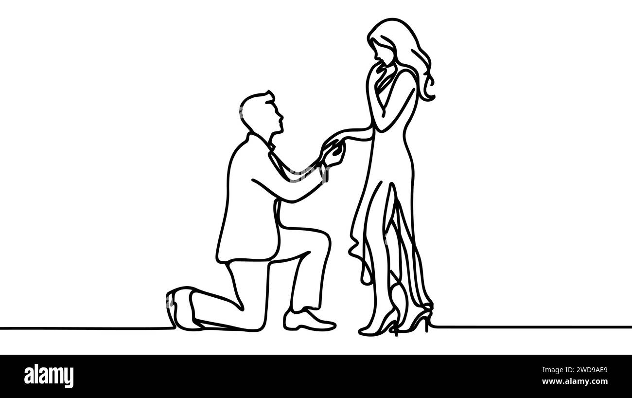 man stands on one knee and puts a ring on the finger of her left hand ...