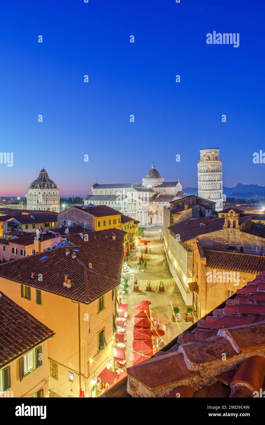 PISA, ITALY - DECEMBER 16, 2021: The Leaning Tower of Pisa in the Square of Miracles at twilight. Stock Photo