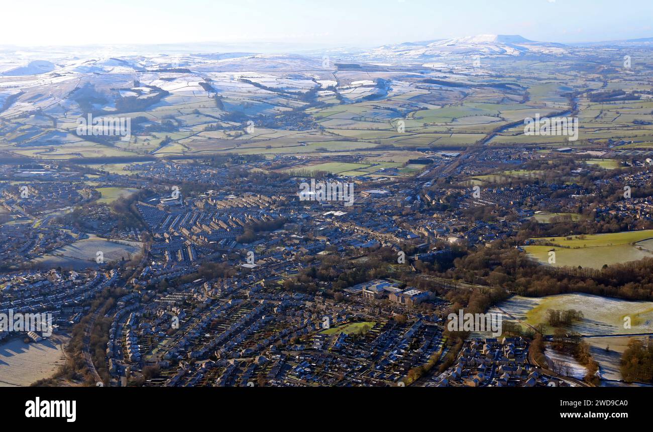 aerial view of Skipton in North Yorkshire from the east looking west towards the snow-capped Pennine hills Stock Photo