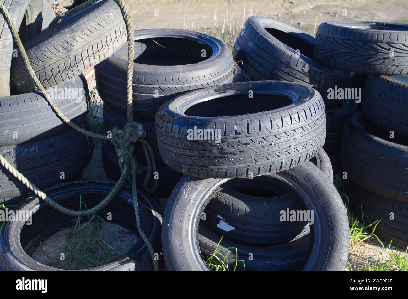 Pile of old discarded tyres Stock Photo
