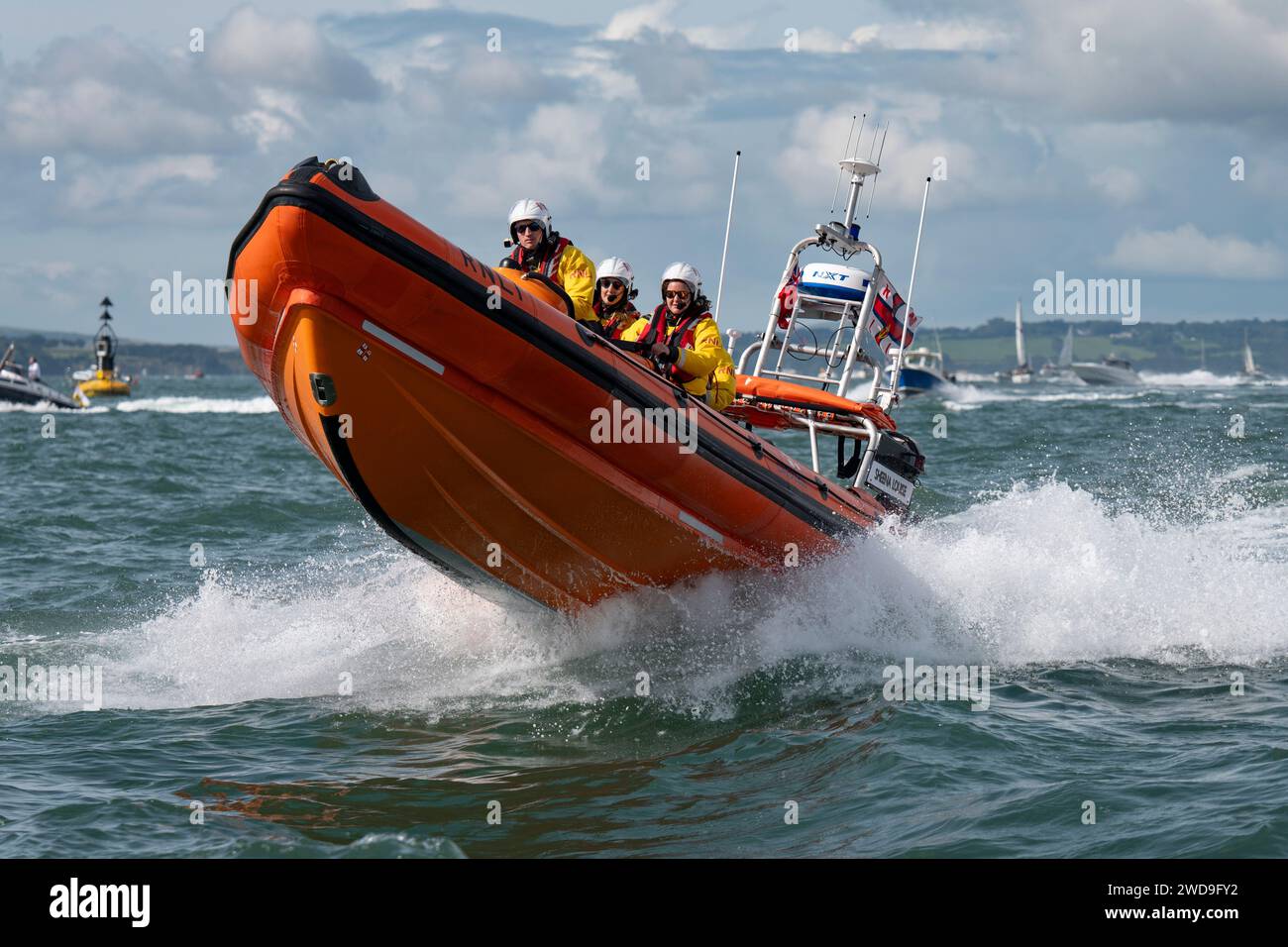 The Cowes Inshore Lifeboat Sheena Louise an Atlantic 85 RIB on duty in the Solent off the North coast of the Isle of Wight during a power boat race Stock Photo