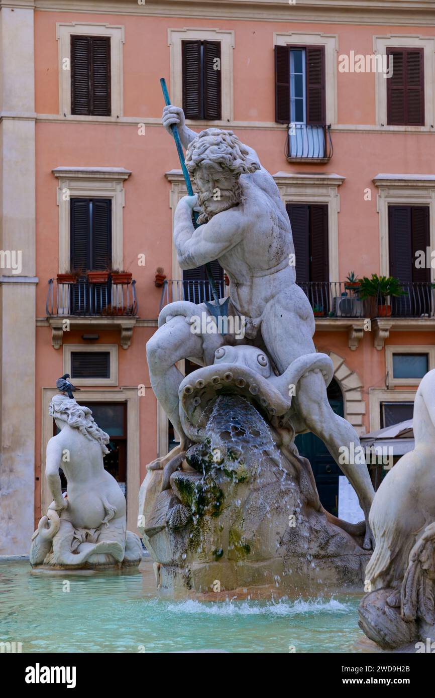 Fountain of Neptune in Navona Square in Rome, Italy: detail of sculpture of Neptune fighting with an octopus. Stock Photo