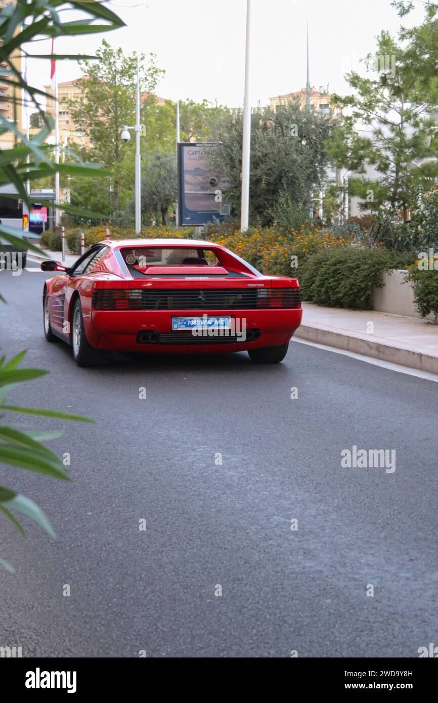 Ferrari Testarossa driving along a street in Monte Carlo, Monaco Stock Photo