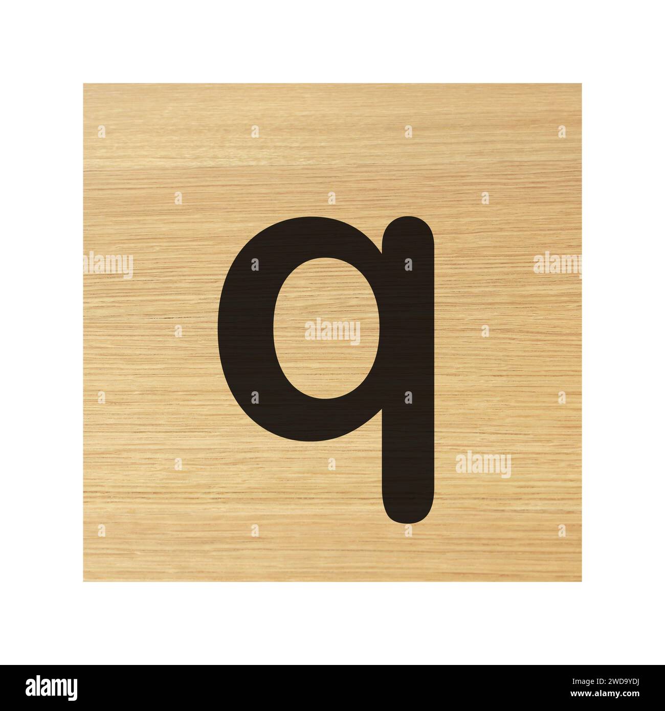small q wood block on white with clipping path Stock Photo