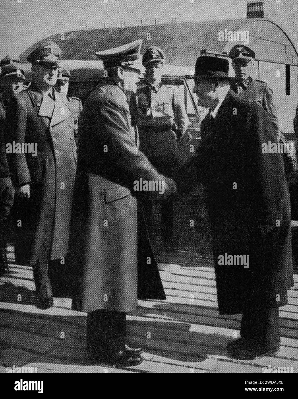 Mussolino saying his goodbyes to Adolf Hitler prior to his return to Italy. He had been released by German troops from the Gran Sassa Hotel in the Abruzzo Mountains following his overthrow in July 1943, during the Second World War. Stock Photo