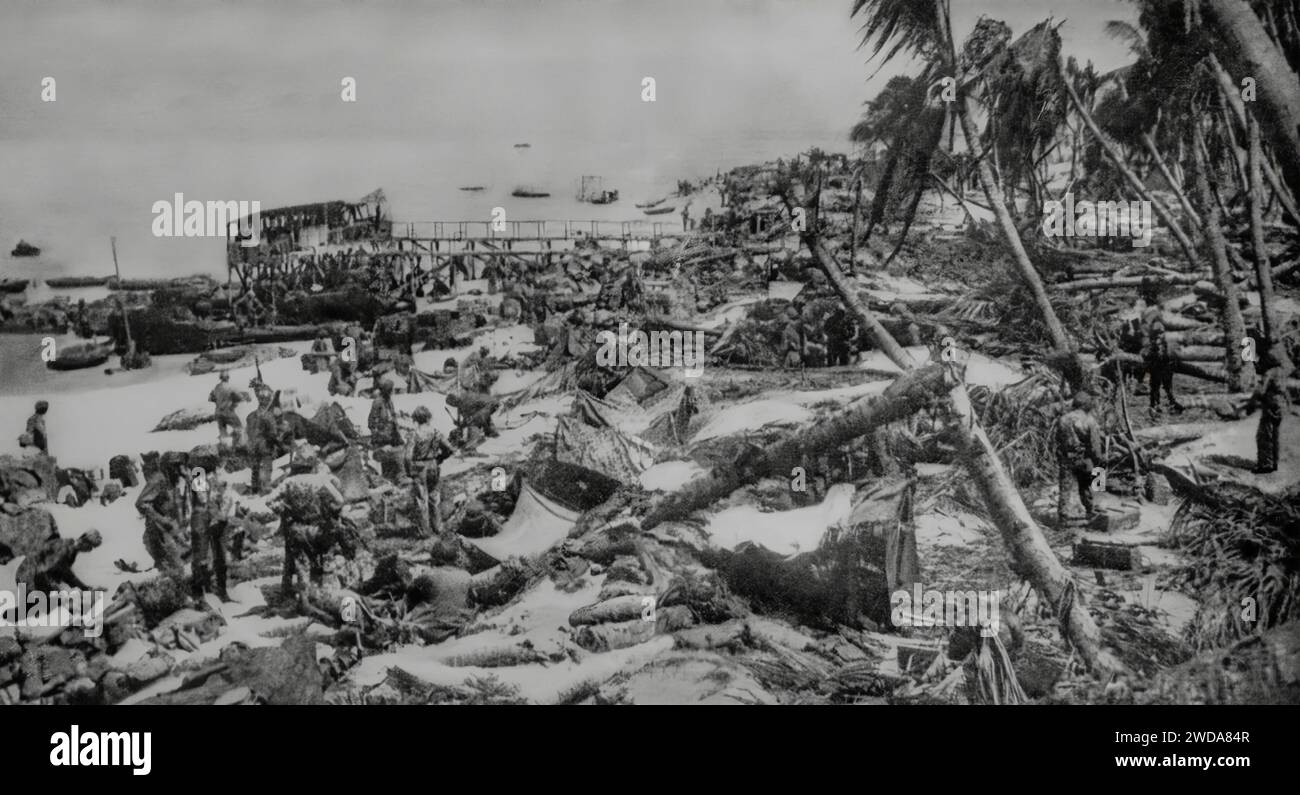 The aftermath of the storming of Tarawa Beach in the Gilbert Islands by U.S. Marines. The assault on 20th November 1943, on the islands during the Second World War was one of the bloodiest of the war with over a 1,000 Americans killed, many injured and 5,000 Japanese troops Stock Photo