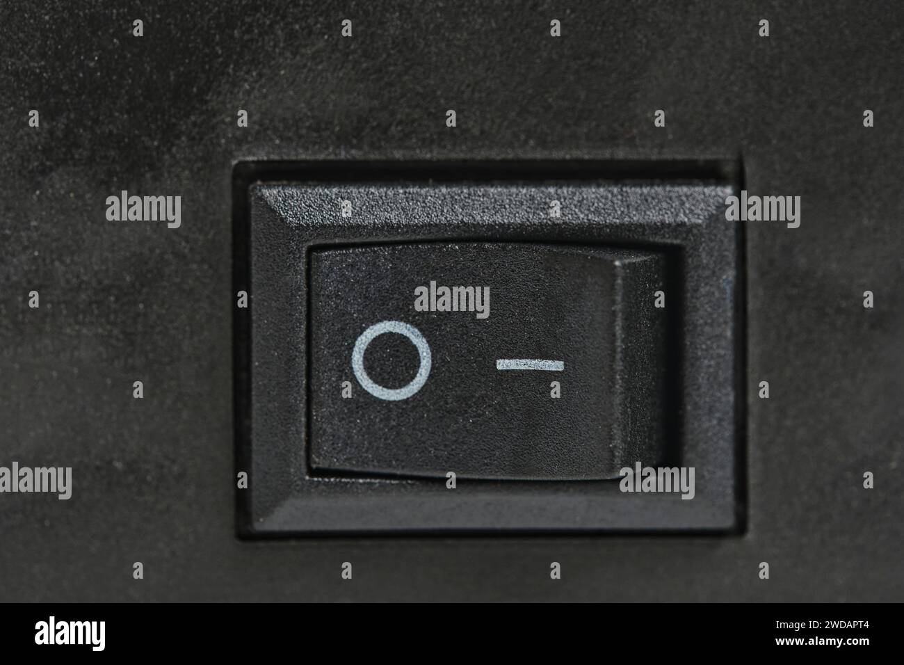 Black plastic power on and off button Stock Photo - Alamy