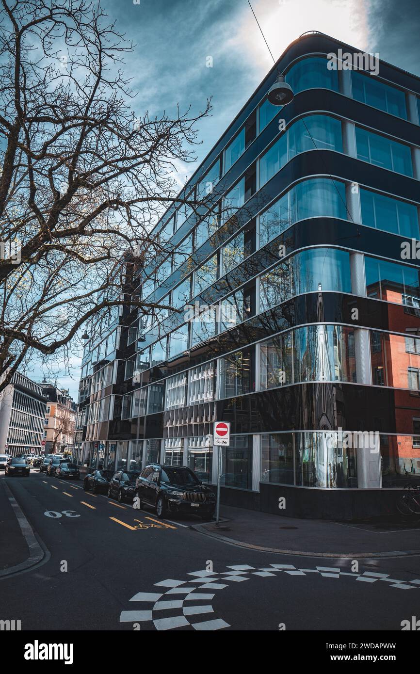 Modern office building with multiple windows along its side Stock Photo