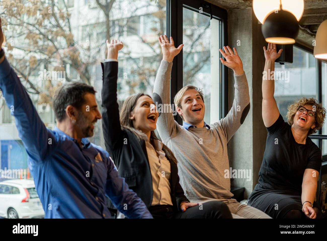 Having fun together in the cafe while smiling Stock Photo