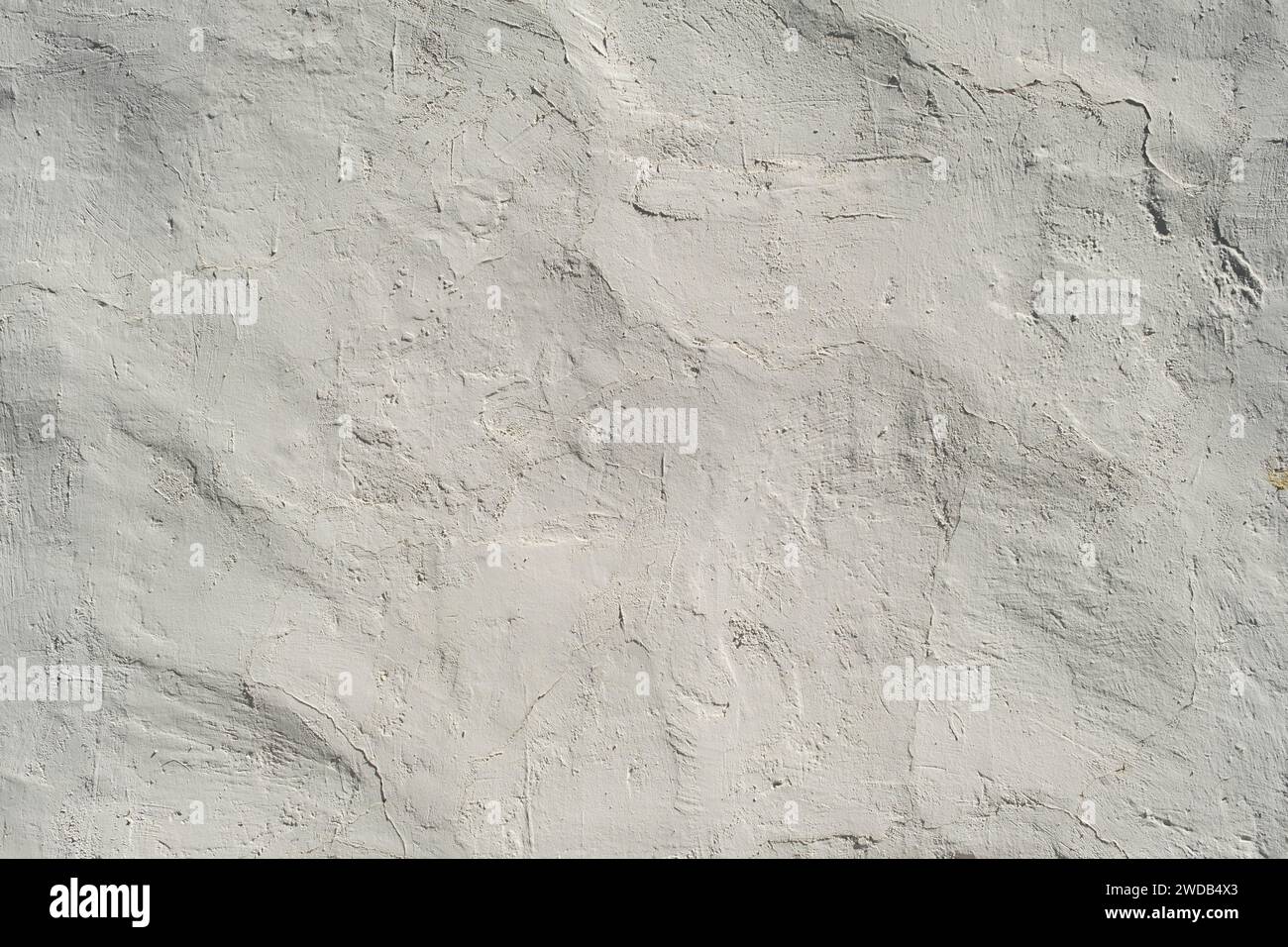 Old rustic limewashed wall plaster grunge background Stock Photo