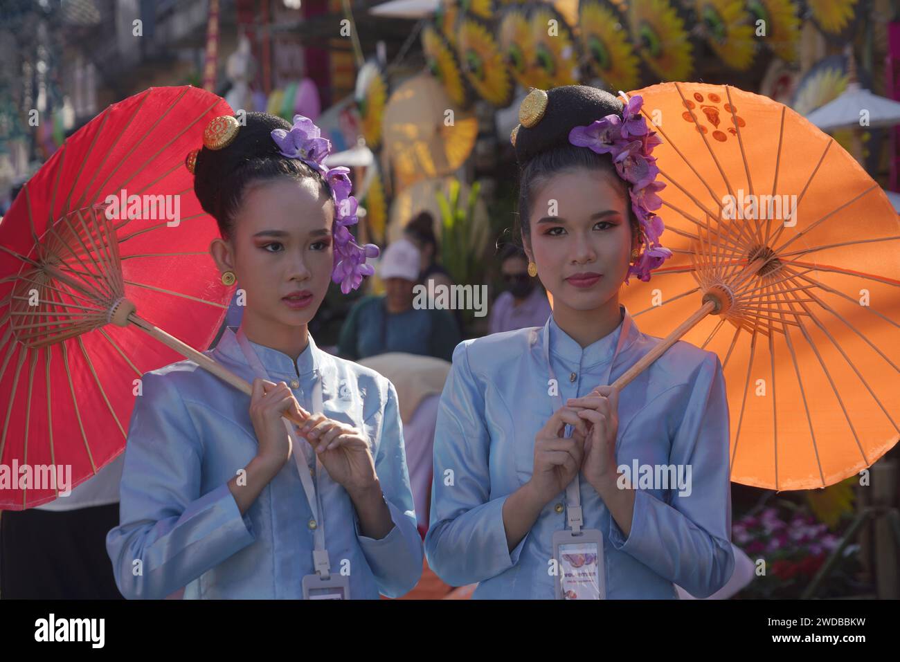 CHIANGMAI THAILAND JANUARY 19 : Unidentified peoples in traditional costume during the annual Umbrella festival at San Kampaeng Handicraft festival 20 Stock Photo