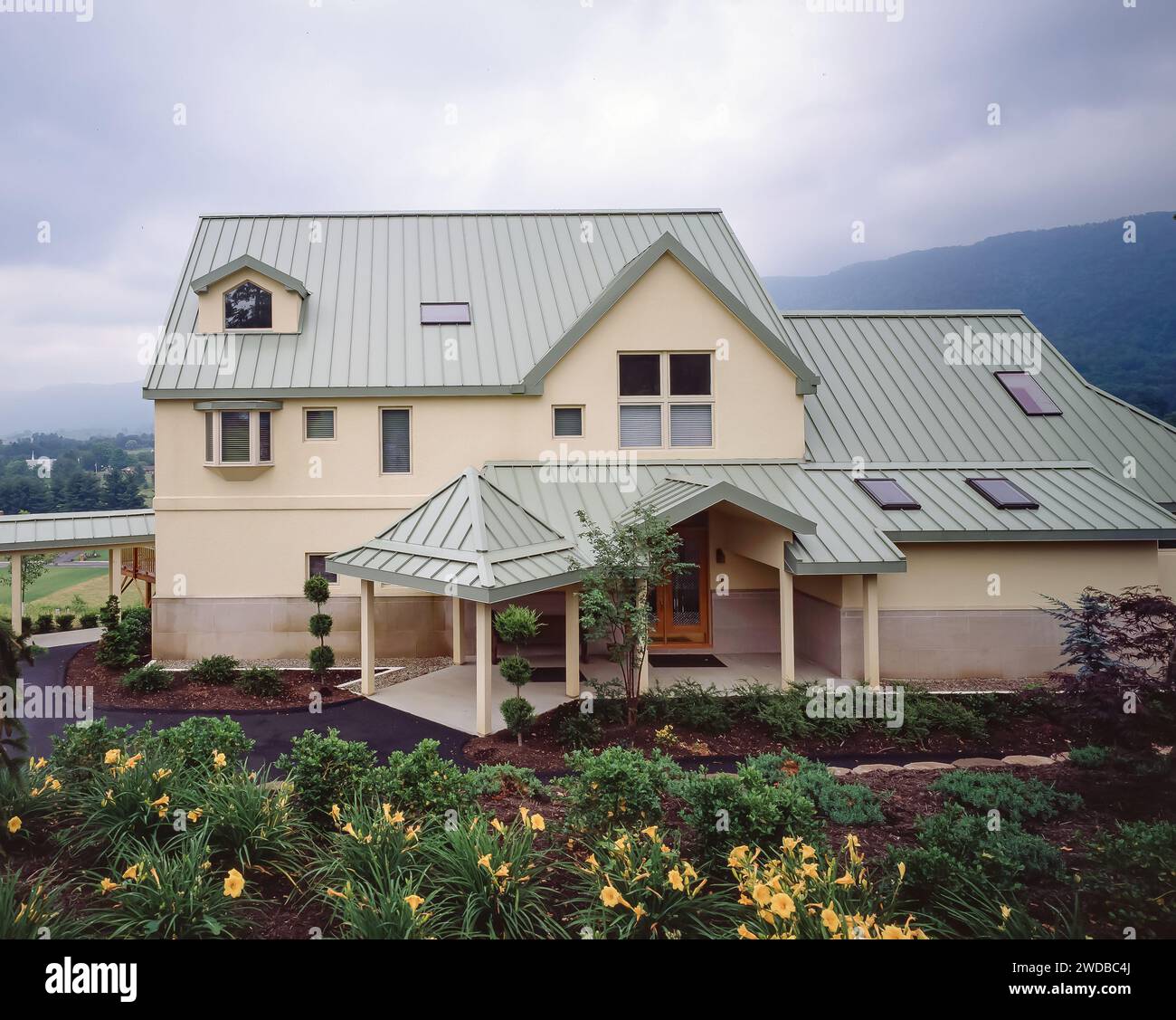 View of Personal residence house with metal roof Stock Photo - Alamy