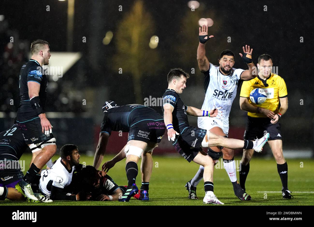 Glasgow Warriors' Horne kicks the ball clear from danger during