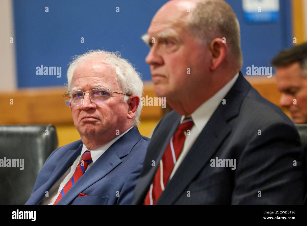 Defendant John Eastman, left, looks toward attorney Buddy Parker during