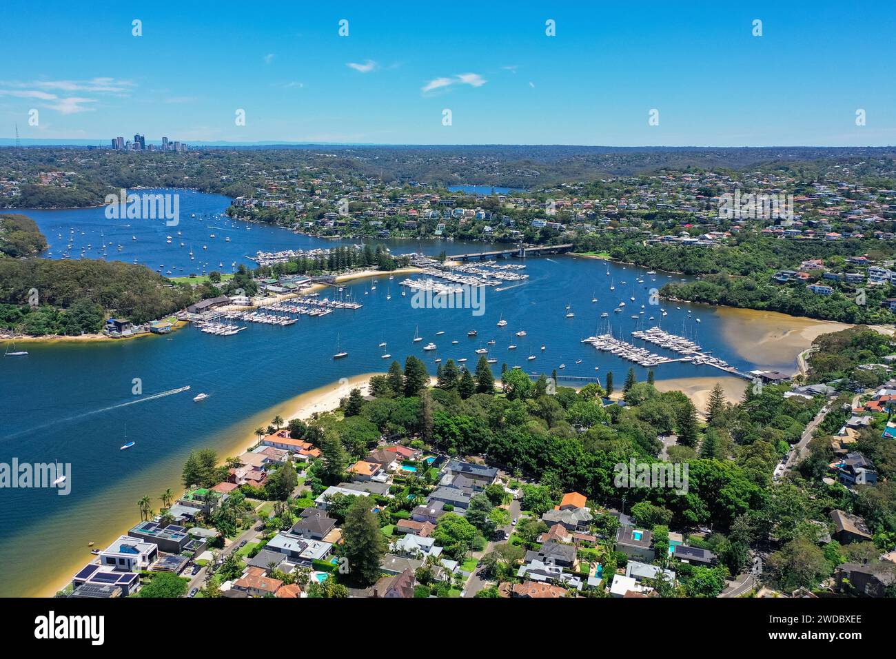 Beautiful high angle aerial drone view of Spit Bridge, Clontarf Beach and Sandy Bay in the suburb of Clontarf, Sydney, New South Wales, Australia. Nor Stock Photo